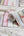 Collage-Bookcase-Pink-Wallpaper-by-Graham-and-Brown-Fresco-51-111